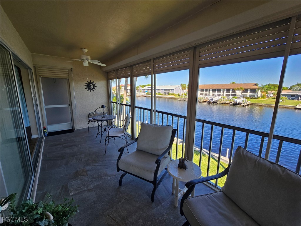 4631 Southeast 5th Avenue, Unit 207 Cape Coral, FL 33904 - Photo 12 of 19 a view of a chairs and table in patio