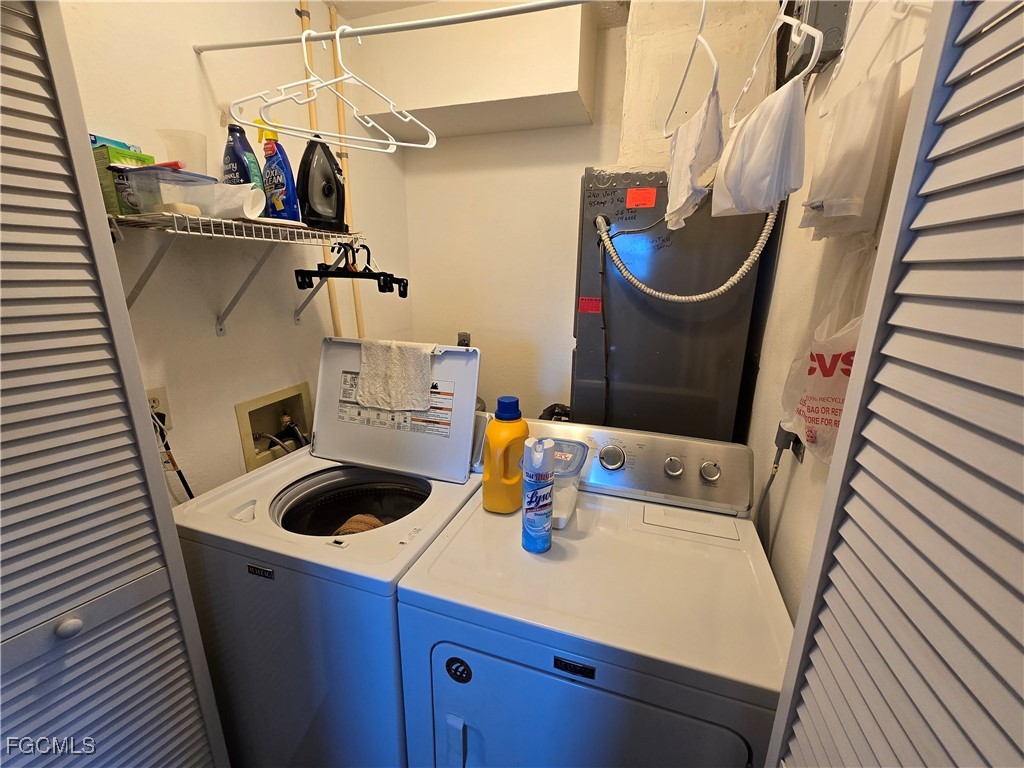 4631 Southeast 5th Avenue, Unit 207 Cape Coral, FL 33904 - Photo 15 of 19 a view of washer and dryer