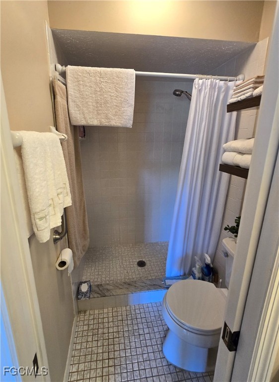 4631 Southeast 5th Avenue, Unit 207 Cape Coral, FL 33904 - Photo 8 of 19 a bathroom with a sink and toilet