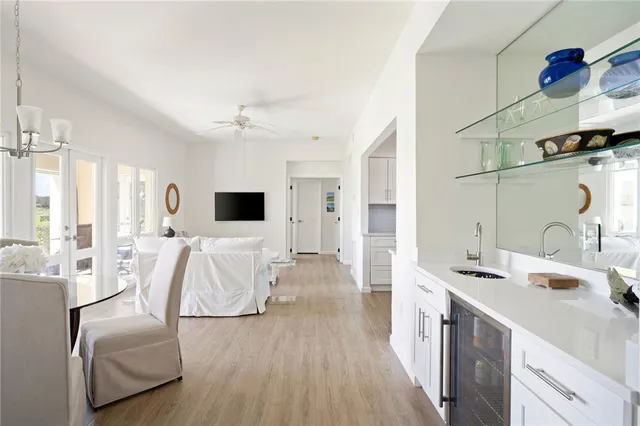 a view of living room with furniture and flat screen tv