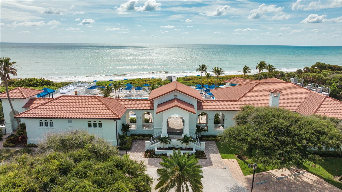 5045 Harmony Circle, Unit 102 Vero Beach, FL 32967 - Photo 23 of 28 an aerial view of multiple house