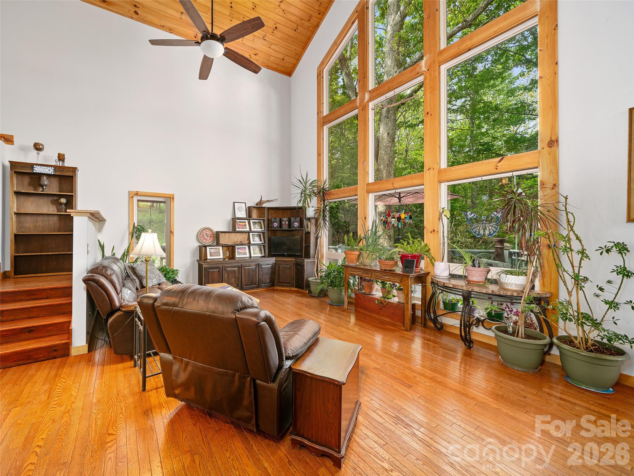 228 Continental Divide Road Spruce Pine, NC 28777 - Photo 2 of 48 a living room with furniture and a large window