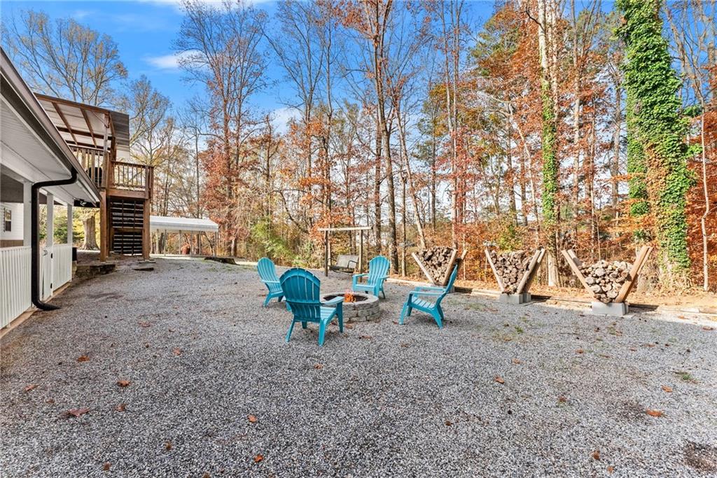 6045 Mockingbird Road Cumming, GA 30028 - Photo 50 of 55 a view of outdoor space yard and patio