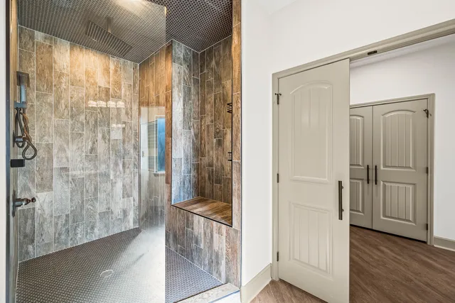 a view of a livingroom with a ceiling fan and window
