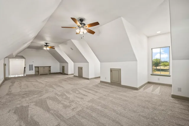 a view of a backyard of the house