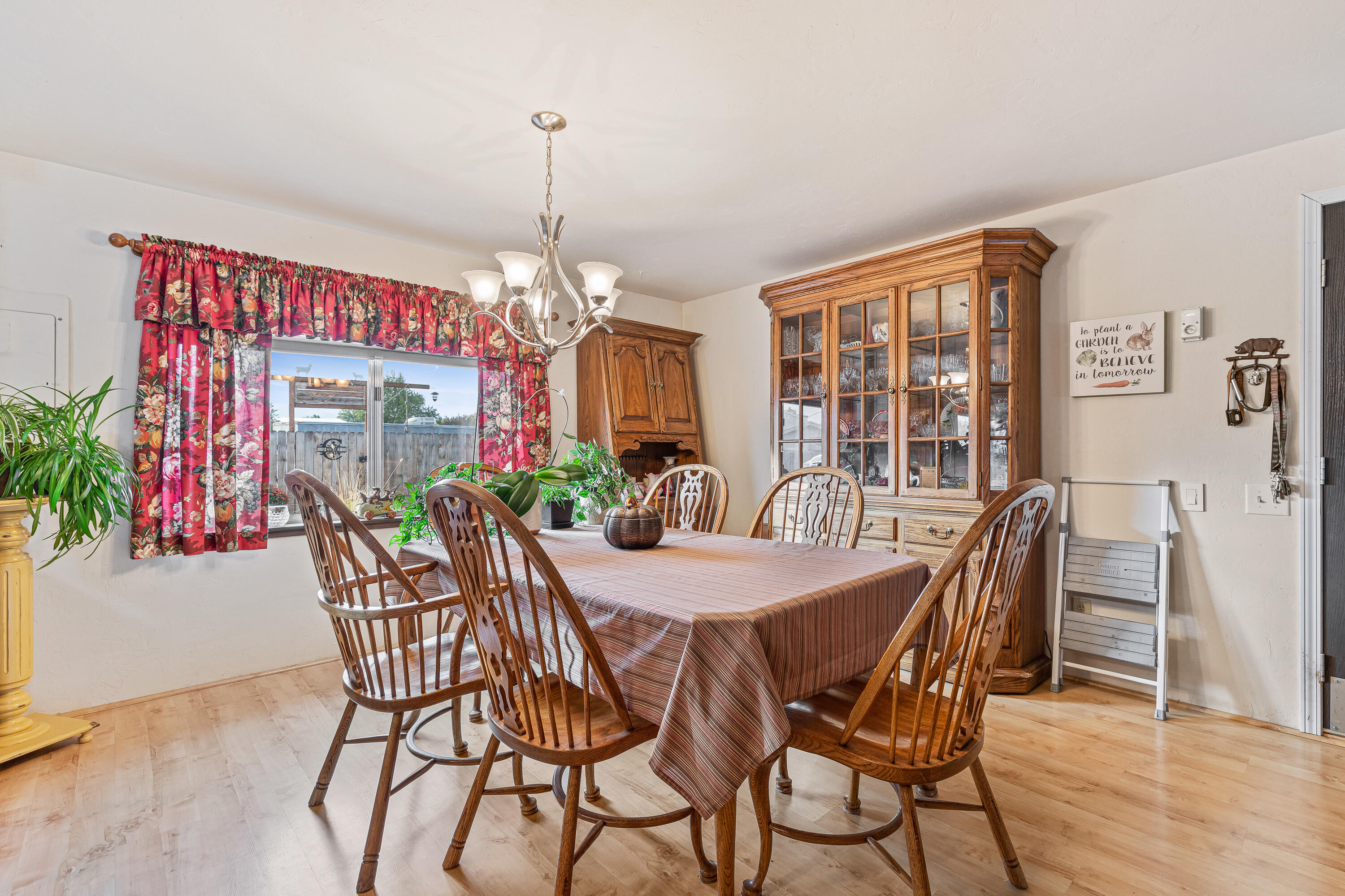 2627 Merriman Road Medford, OR 97501 - Photo 5 of 25 a view of a dining room with furniture window and wooden floor
