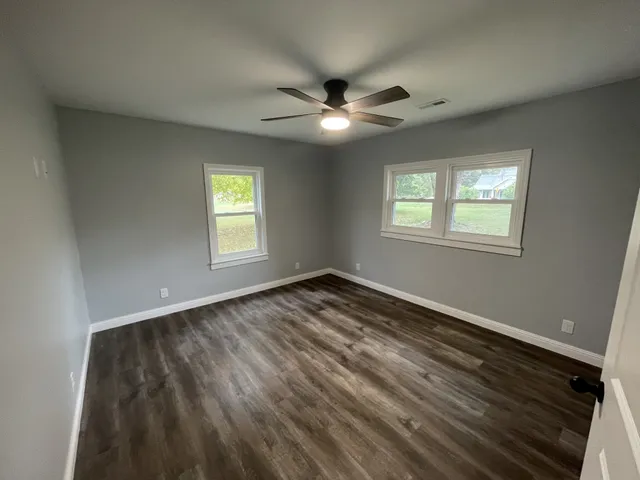 a view of an empty room and window
