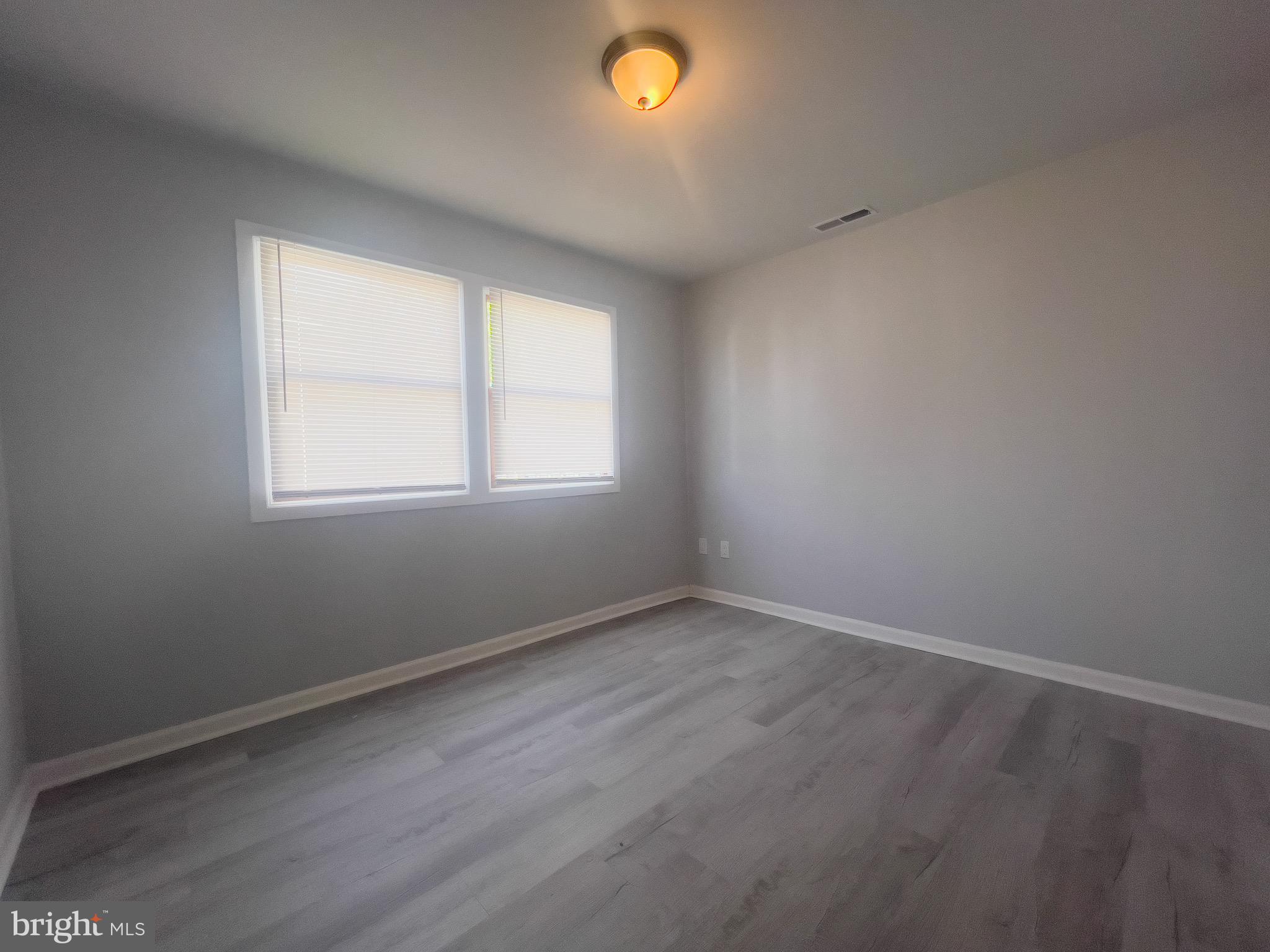 384 Windsor Drive Bellmawr, NJ 08031 - Photo 14 of 23 an empty room with a window