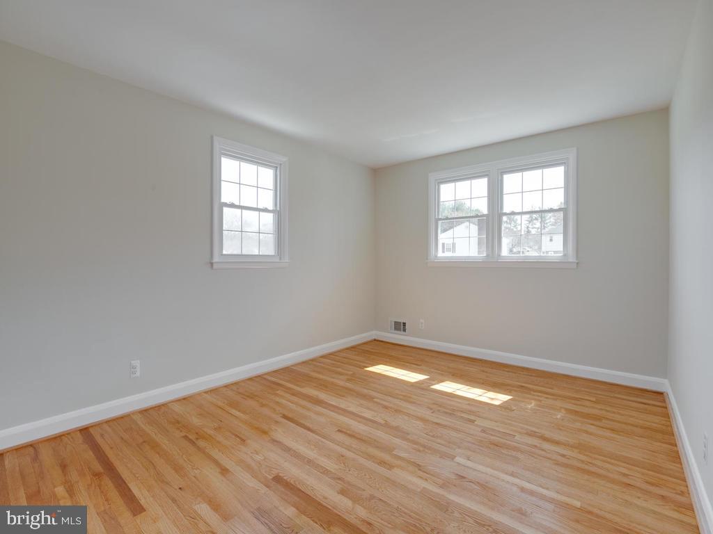 116 Felton Road Lutherville-Timonium, MD 21093 - Photo 21 of 40 Spacious bedroom 2 and refinished floors