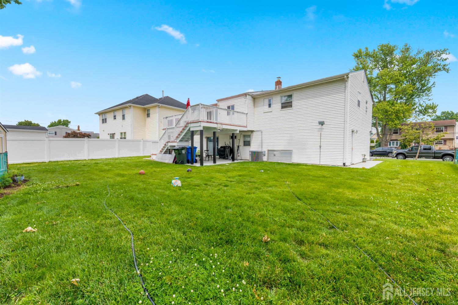 115 Vernon Way Port Reading, NJ 07064 - Photo 27 of 33 a view of a house with a yard and a porch