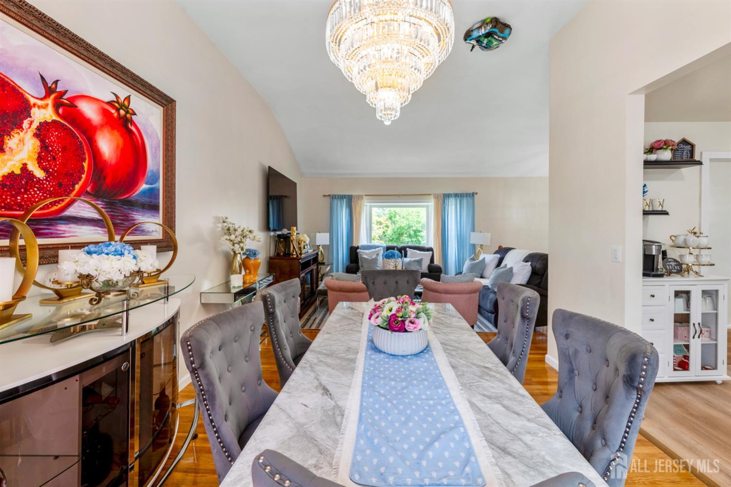 115 Vernon Way Port Reading, NJ 07064 - Photo 8 of 33 a living room with furniture and a wooden floor