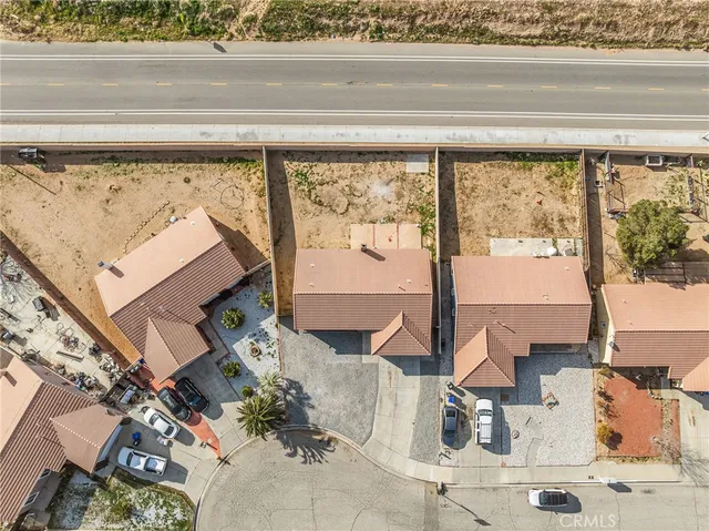 view of living room with furniture and floor to ceiling window