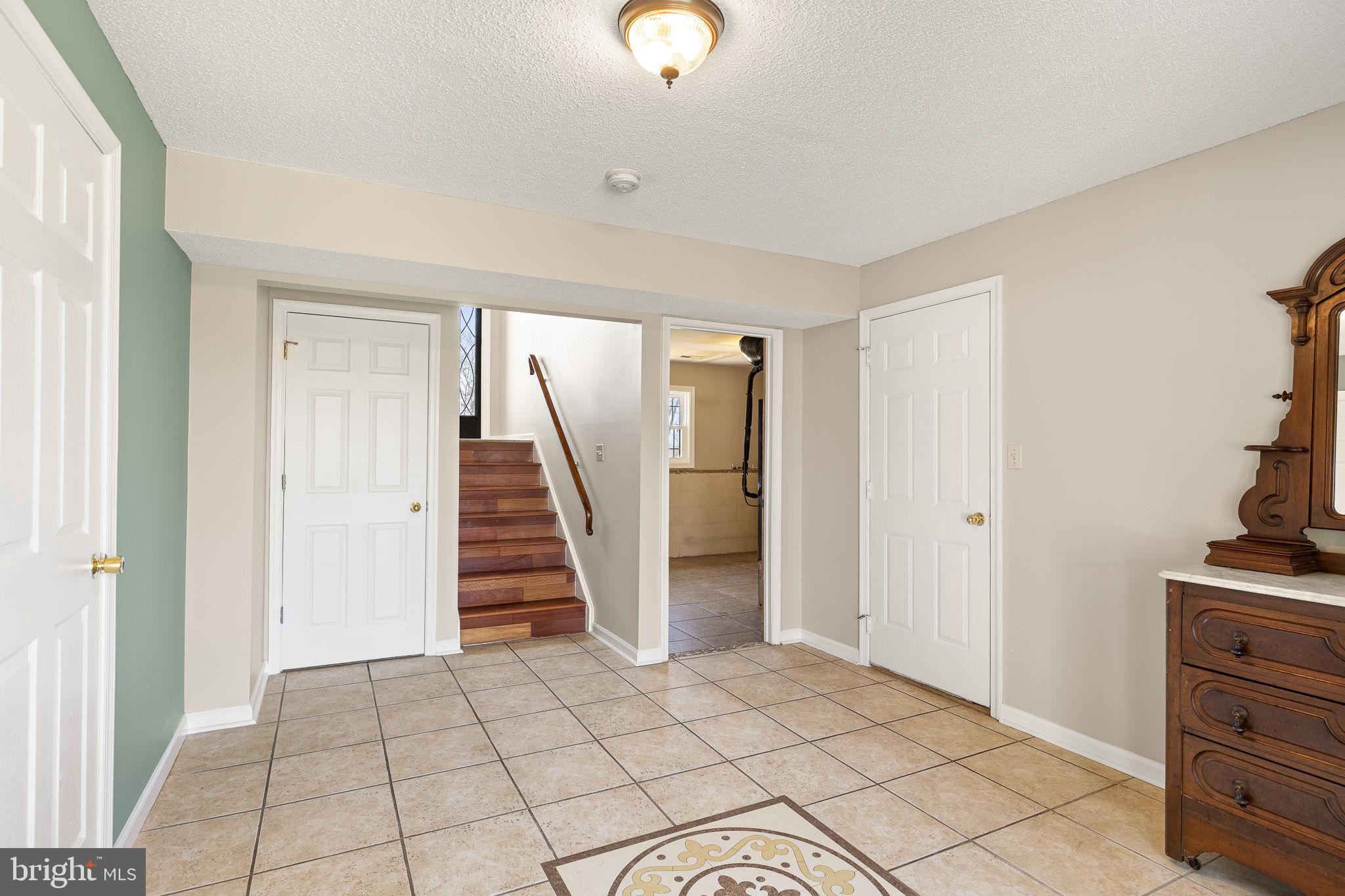 80 Scotsmans Glen Road Capon Bridge, WV 26711 - Photo 20 of 33 View from double doors, Closet and door to garage