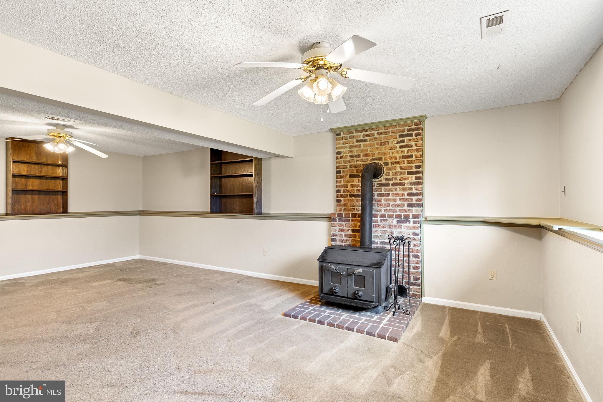 80 Scotsmans Glen Road Capon Bridge, WV 26711 - Photo 21 of 33 Fully finished room in lower level. w/woodstove.
