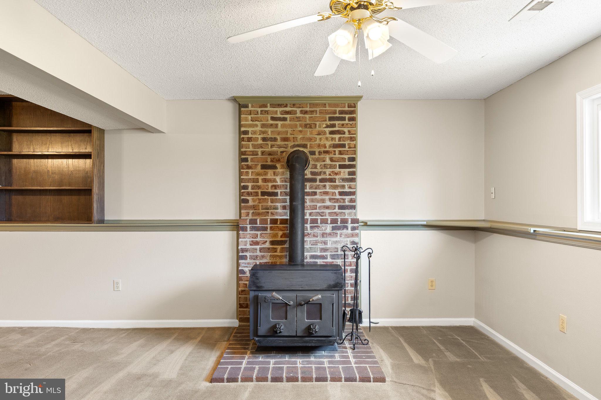 80 Scotsmans Glen Road Capon Bridge, WV 26711 - Photo 22 of 33 Wood Stove for the cold winter nights to warm up.