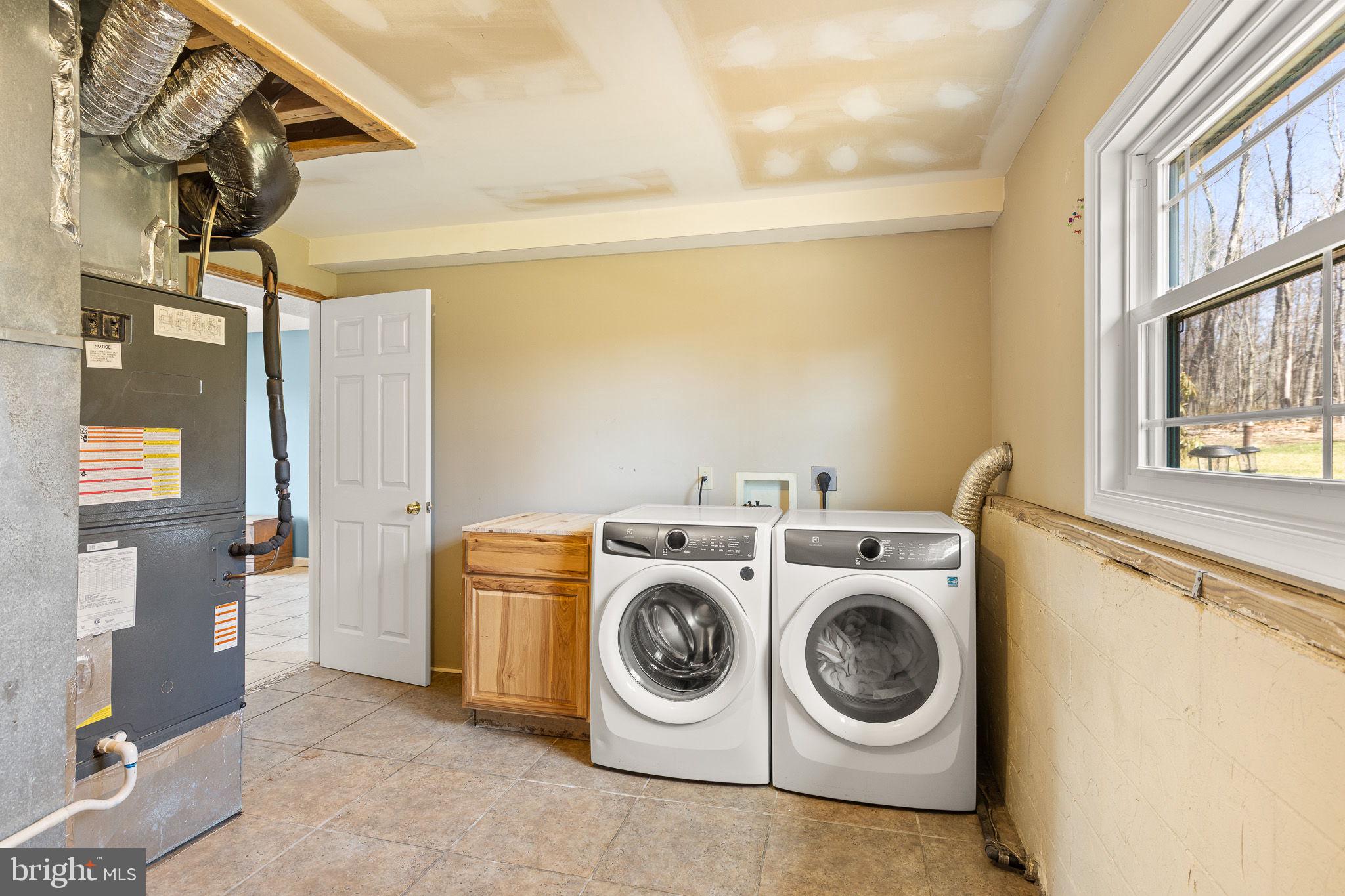 80 Scotsmans Glen Road Capon Bridge, WV 26711 - Photo 23 of 33 Laundry room with plenty of space for storage