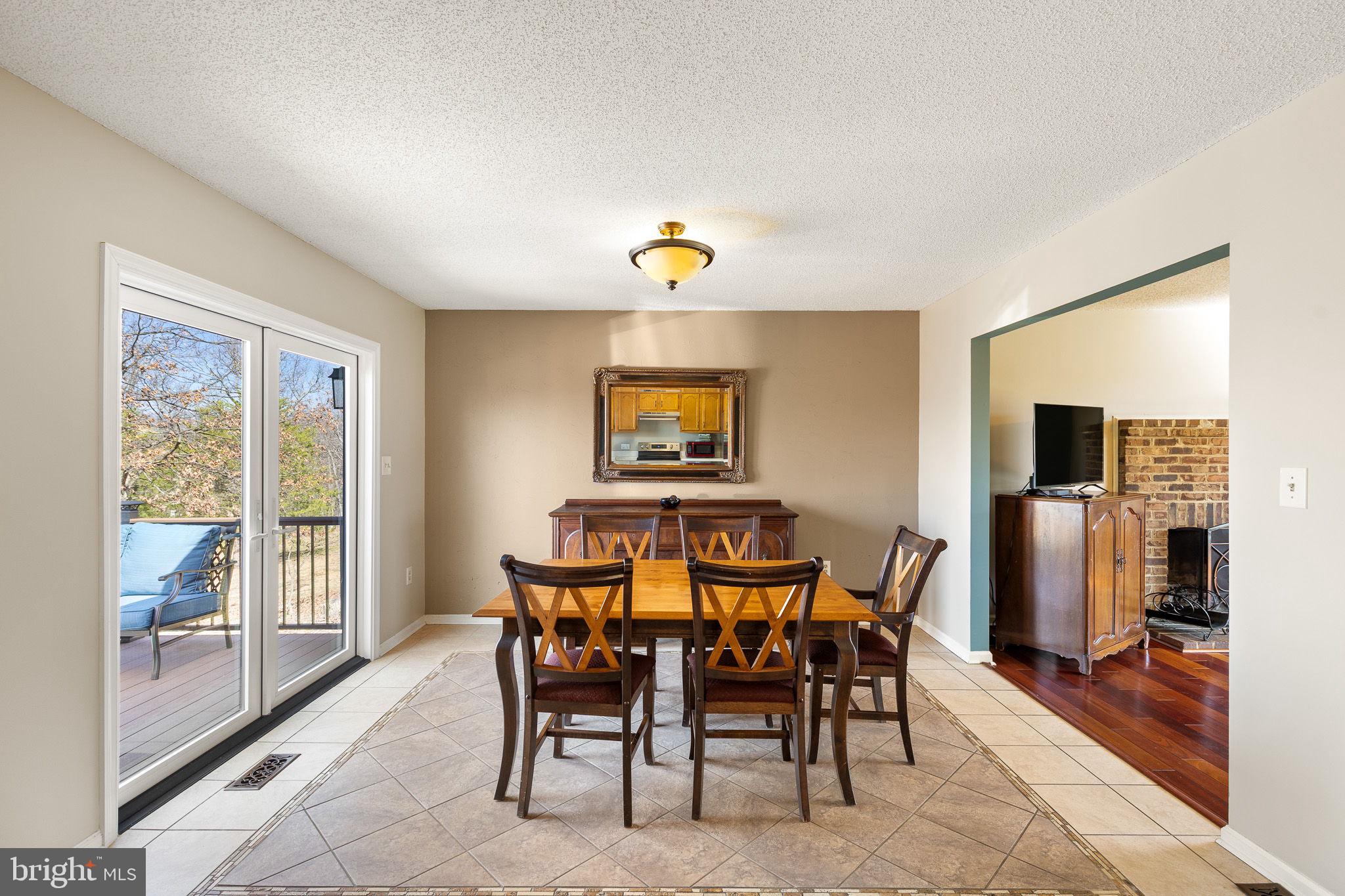 80 Scotsmans Glen Road Capon Bridge, WV 26711 - Photo 8 of 33 Inlaid tile flooring in dining area,
