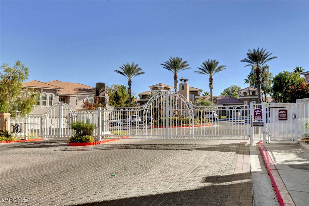 9975 Peace Way, Unit 1034 Las Vegas, NV 89147 - Photo 44 of 73 grand gated entry