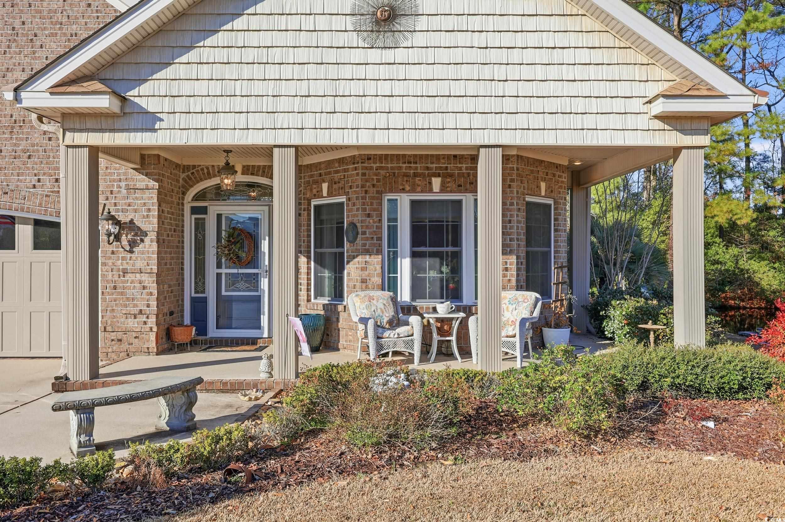 452 Deer Watch Circle Longs, SC 29568 - Photo 3 of 39 View of front of home featuring a porch and brick siding