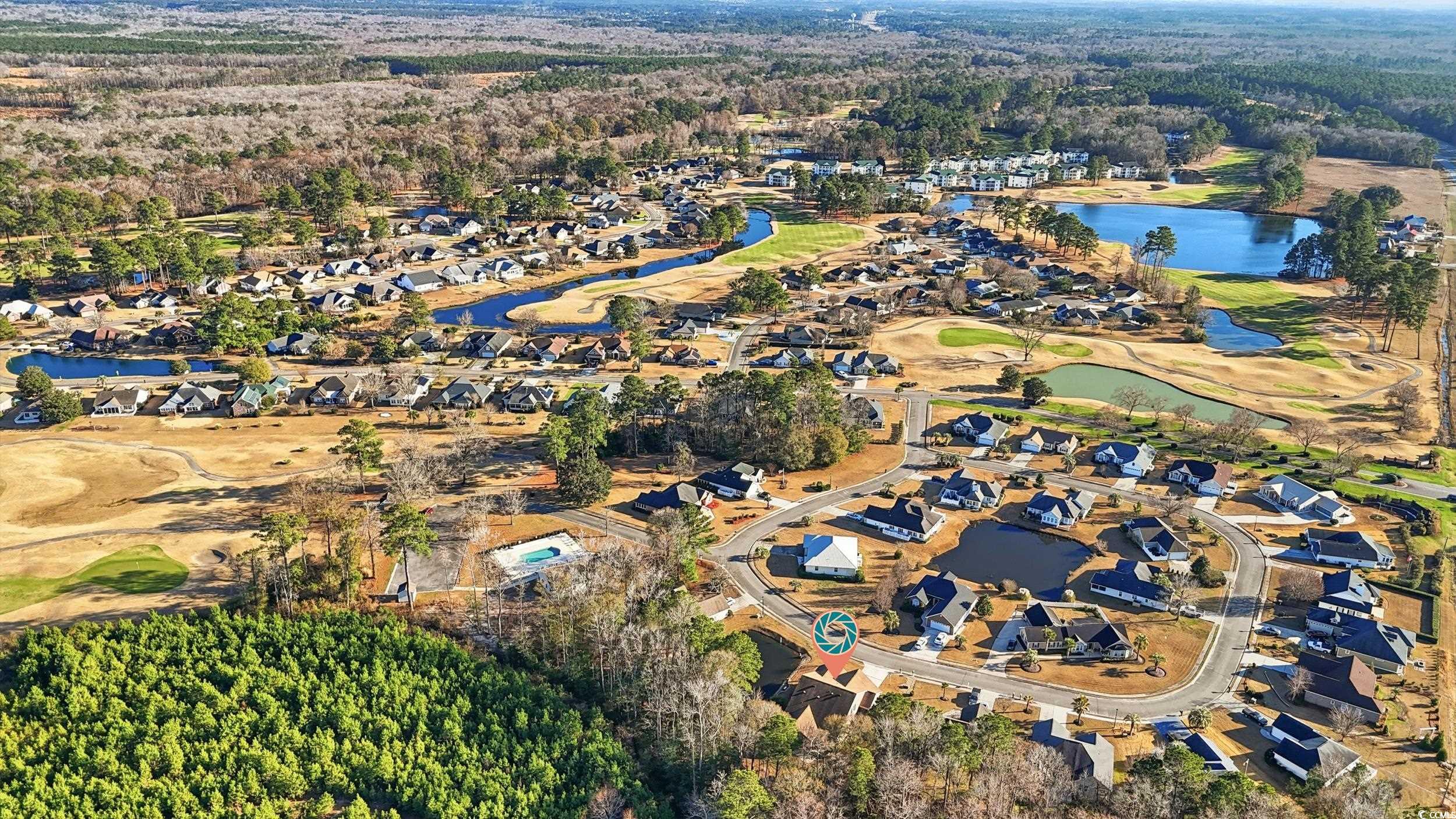 452 Deer Watch Circle Longs, SC 29568 - Photo 37 of 39 Aerial view of property's location featuring a nearby body of water, a local golf course, and nearby suburban area