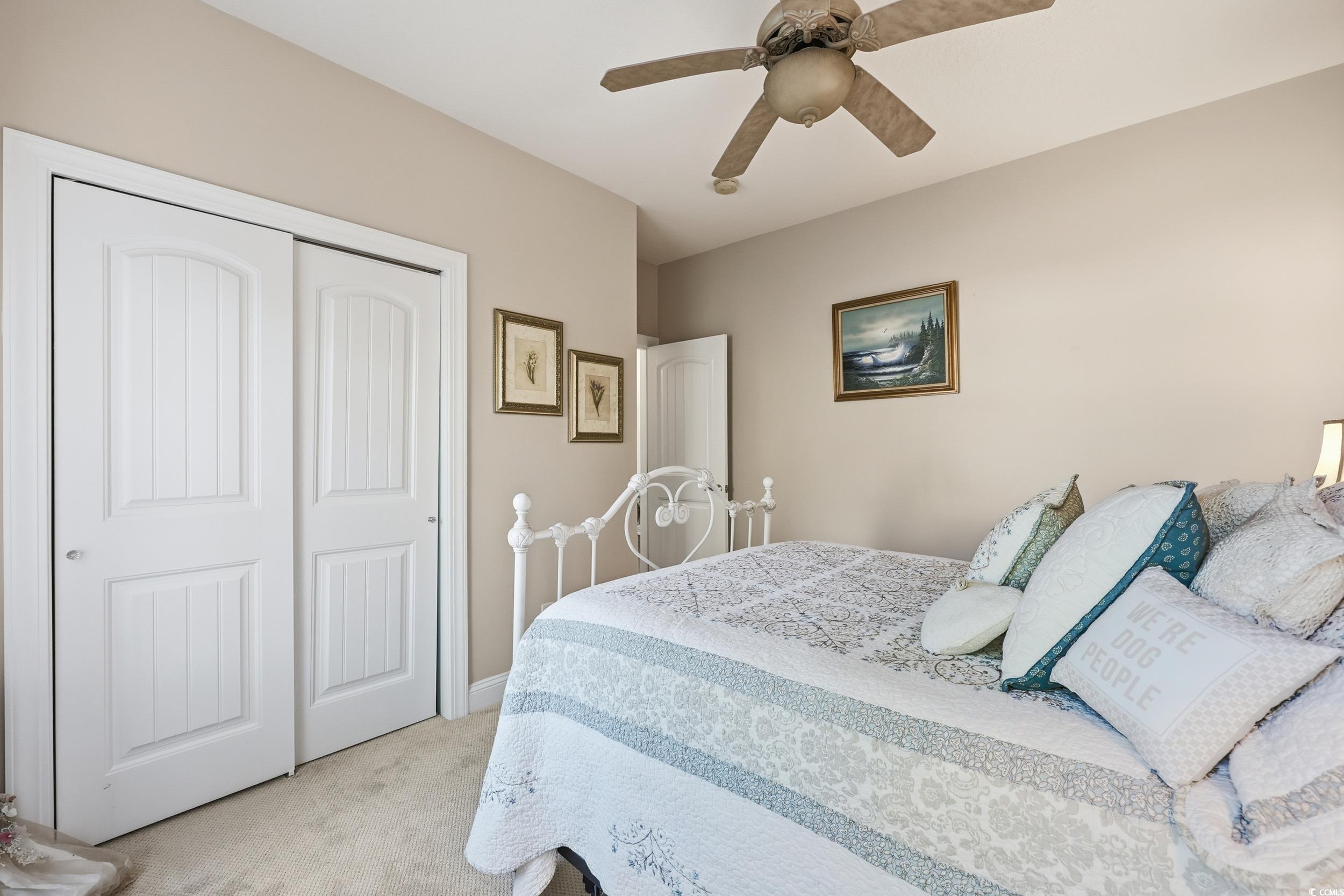 452 Deer Watch Circle Longs, SC 29568 - Photo 9 of 39 Carpeted bedroom with a closet and a ceiling fan