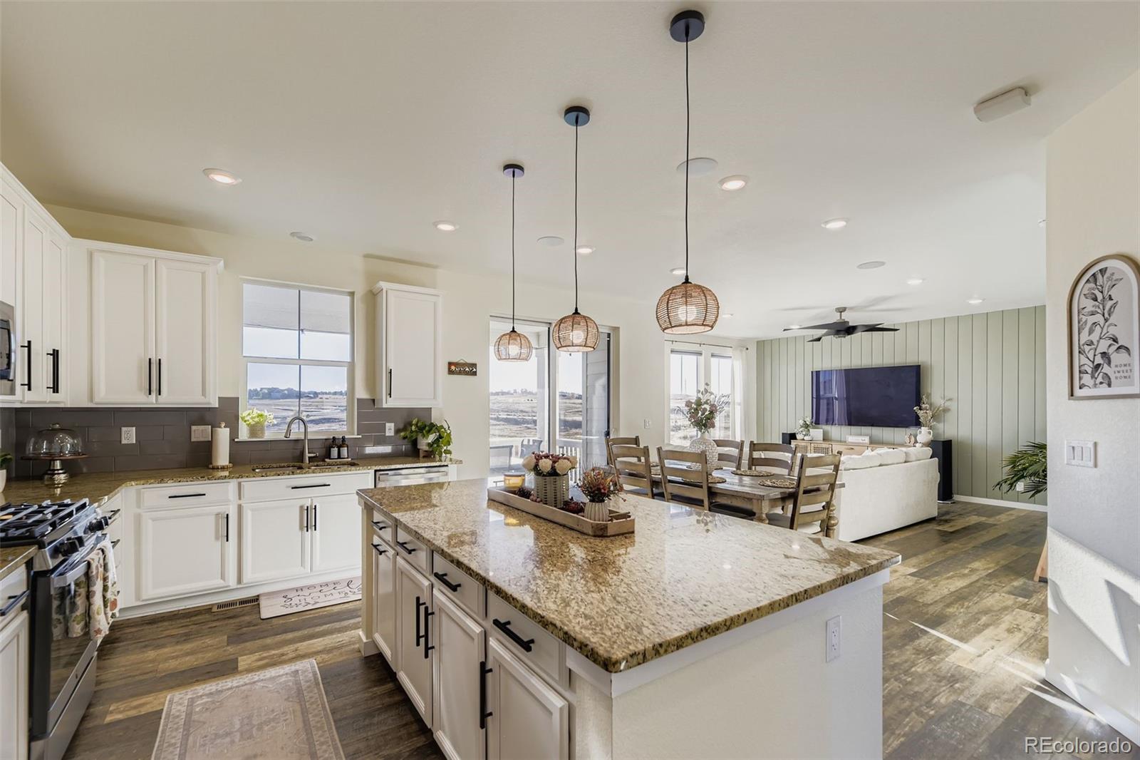 1126 Williams Loop Elizabeth, CO 80107 - Photo 12 of 50 a kitchen with sink stove and cabinets