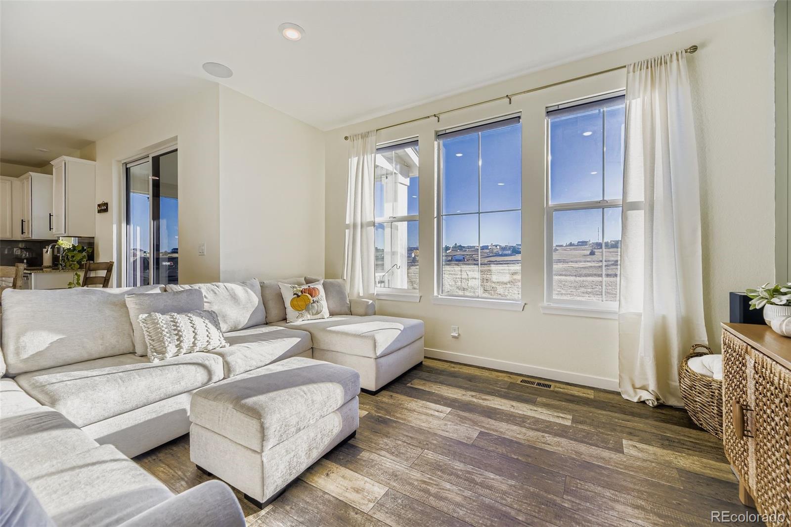 1126 Williams Loop Elizabeth, CO 80107 - Photo 17 of 50 a living room with furniture and a window