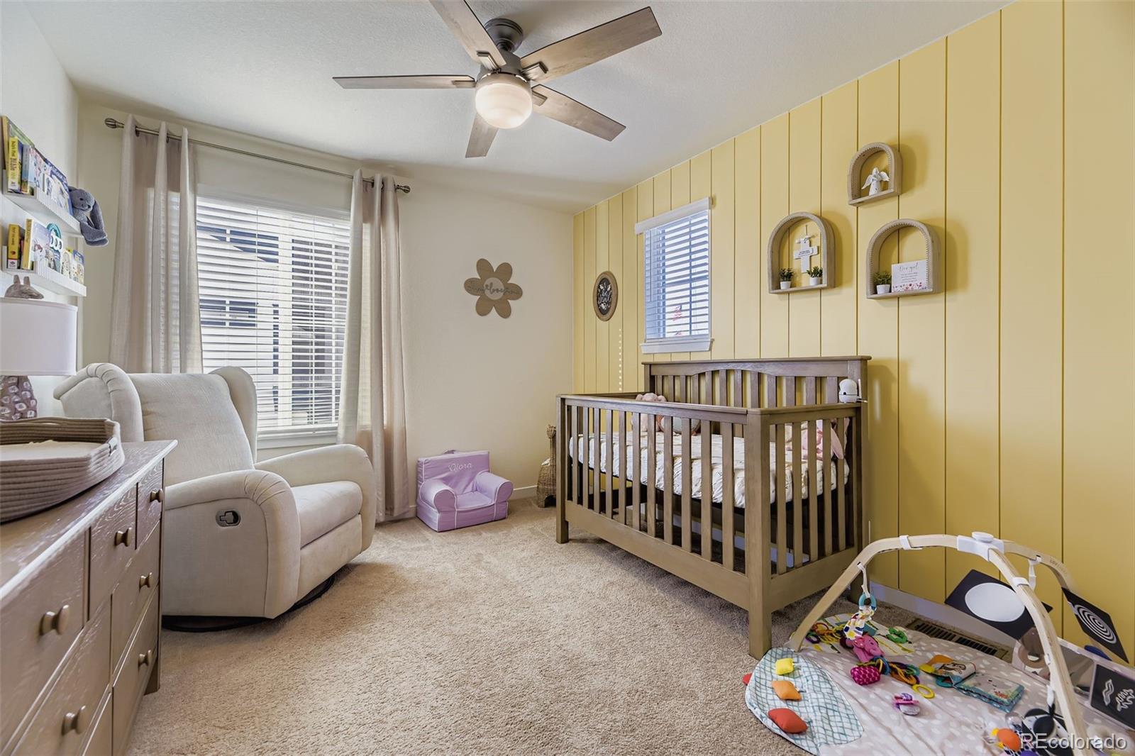1126 Williams Loop Elizabeth, CO 80107 - Photo 24 of 50 a bedroom with a bed and a window