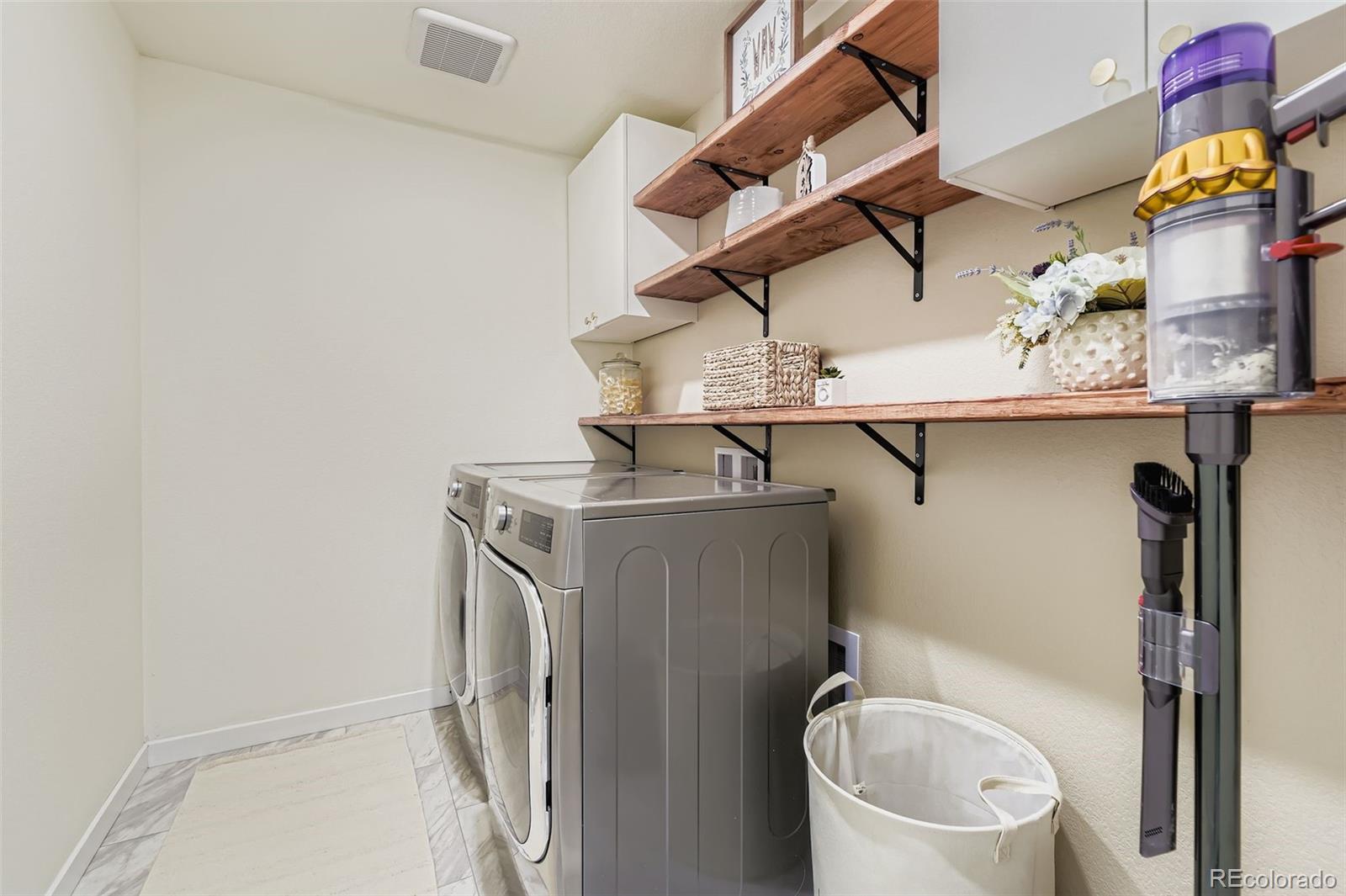 1126 Williams Loop Elizabeth, CO 80107 - Photo 28 of 50 a utility room with dryer and washer