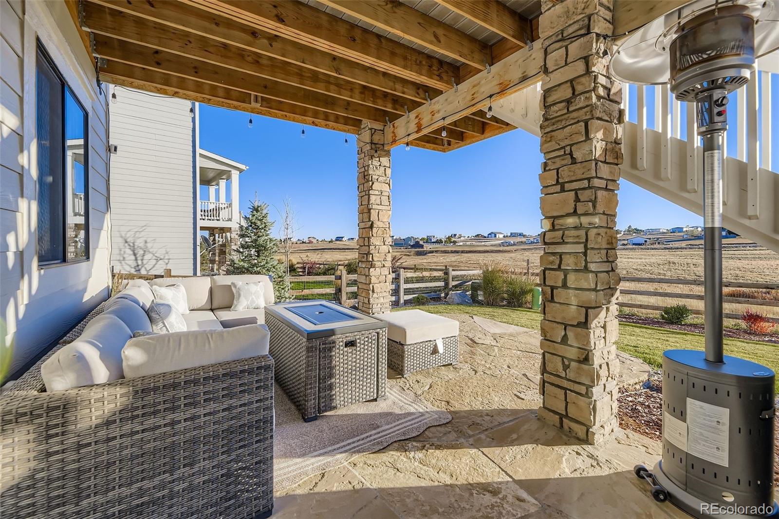 1126 Williams Loop Elizabeth, CO 80107 - Photo 37 of 50 a building outdoor space with patio furniture