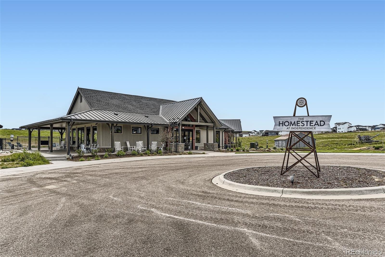 1126 Williams Loop Elizabeth, CO 80107 - Photo 42 of 50 a front view of a house with a yard