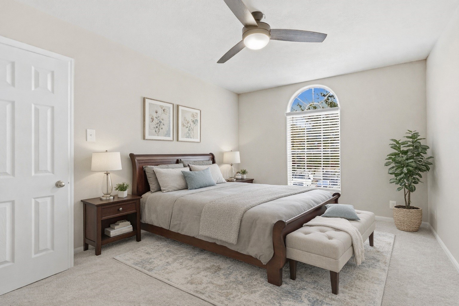 17406 North Riata Lake Cypress, TX 77433 - Photo 15 of 33 Secondary bedroom with arched window, soft natural light, and a comfortable layout (virtually staged).