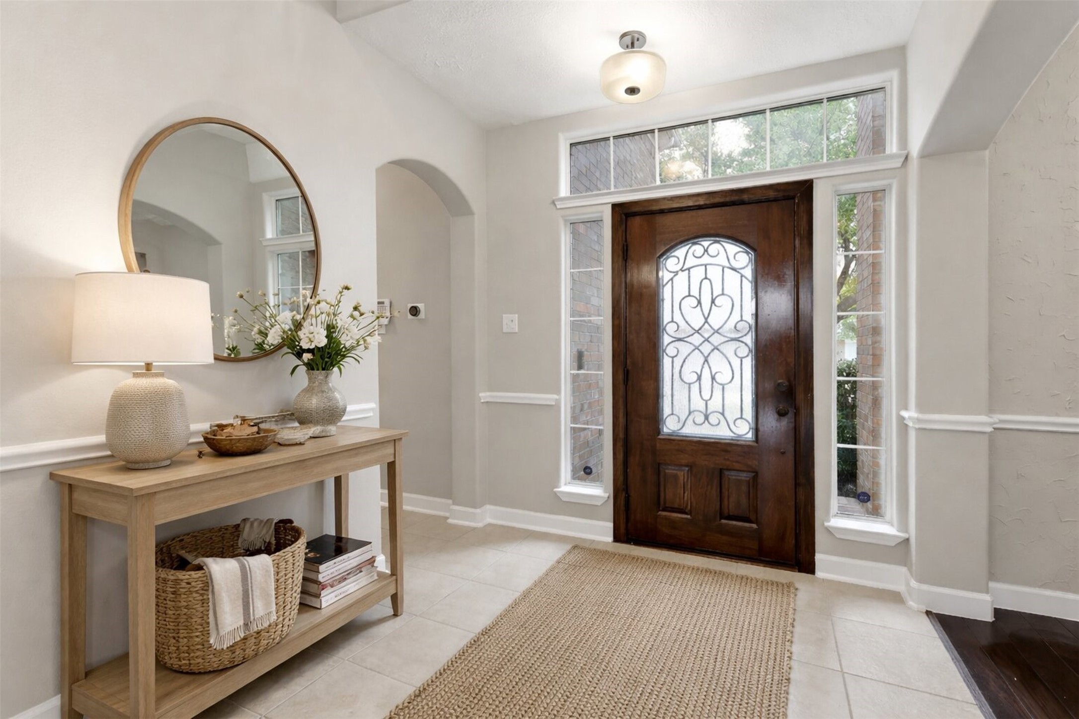 17406 North Riata Lake Cypress, TX 77433 - Photo 4 of 33 Bright foyer with elegant front door, transom windows, and a warm first impression (virtually staged).