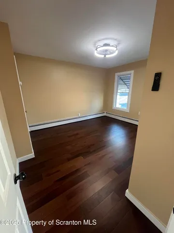 a view of livingroom with hardwood floor and window