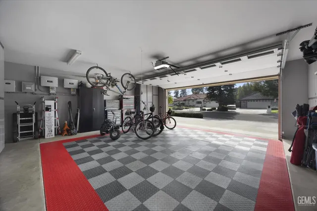 a view of a garage with cars