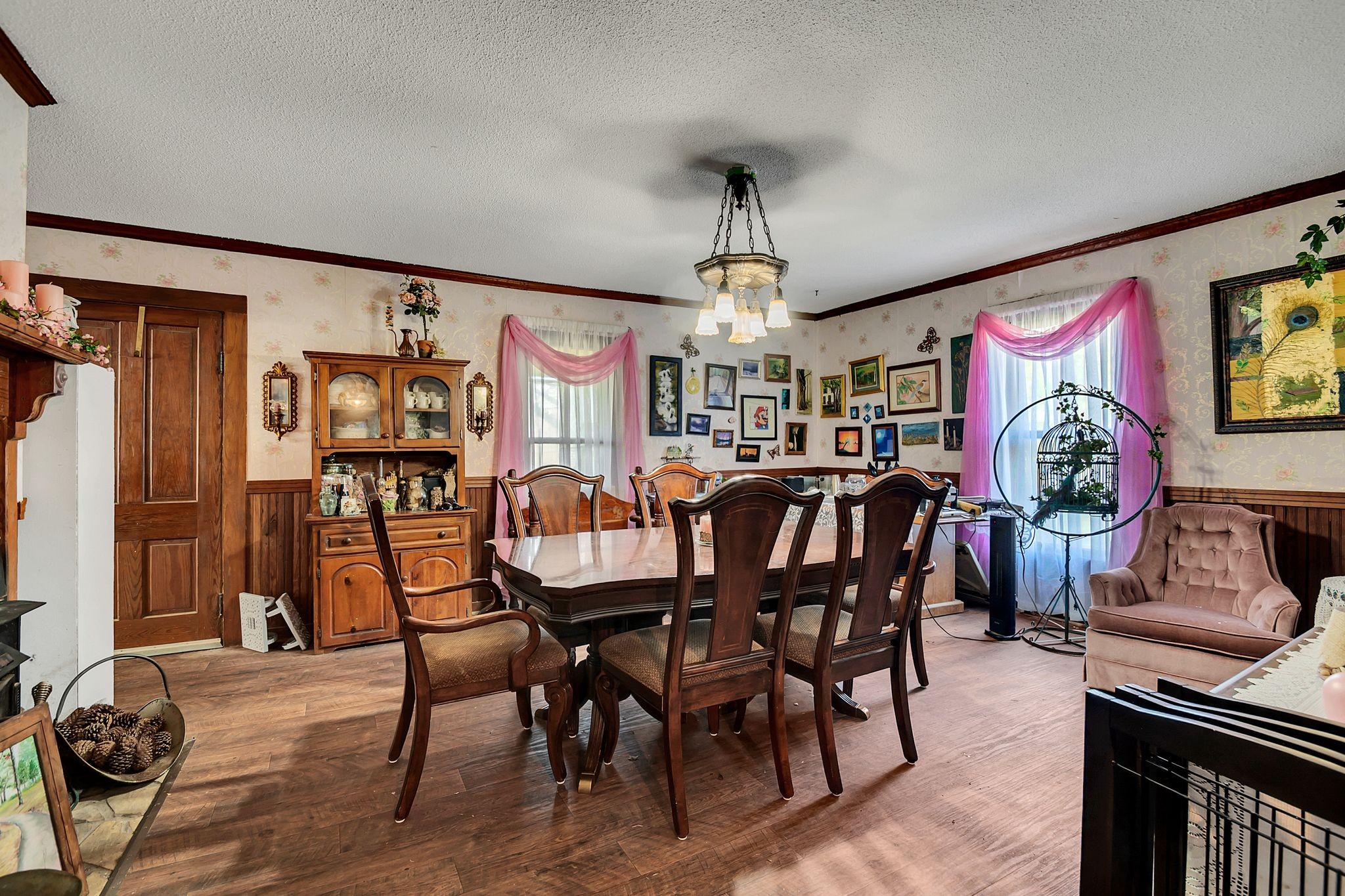 26454 Austin Whitt Road Ardmore, TN 38449 - Photo 14 of 49 a view of a dining room with furniture wooden floor and chandelier