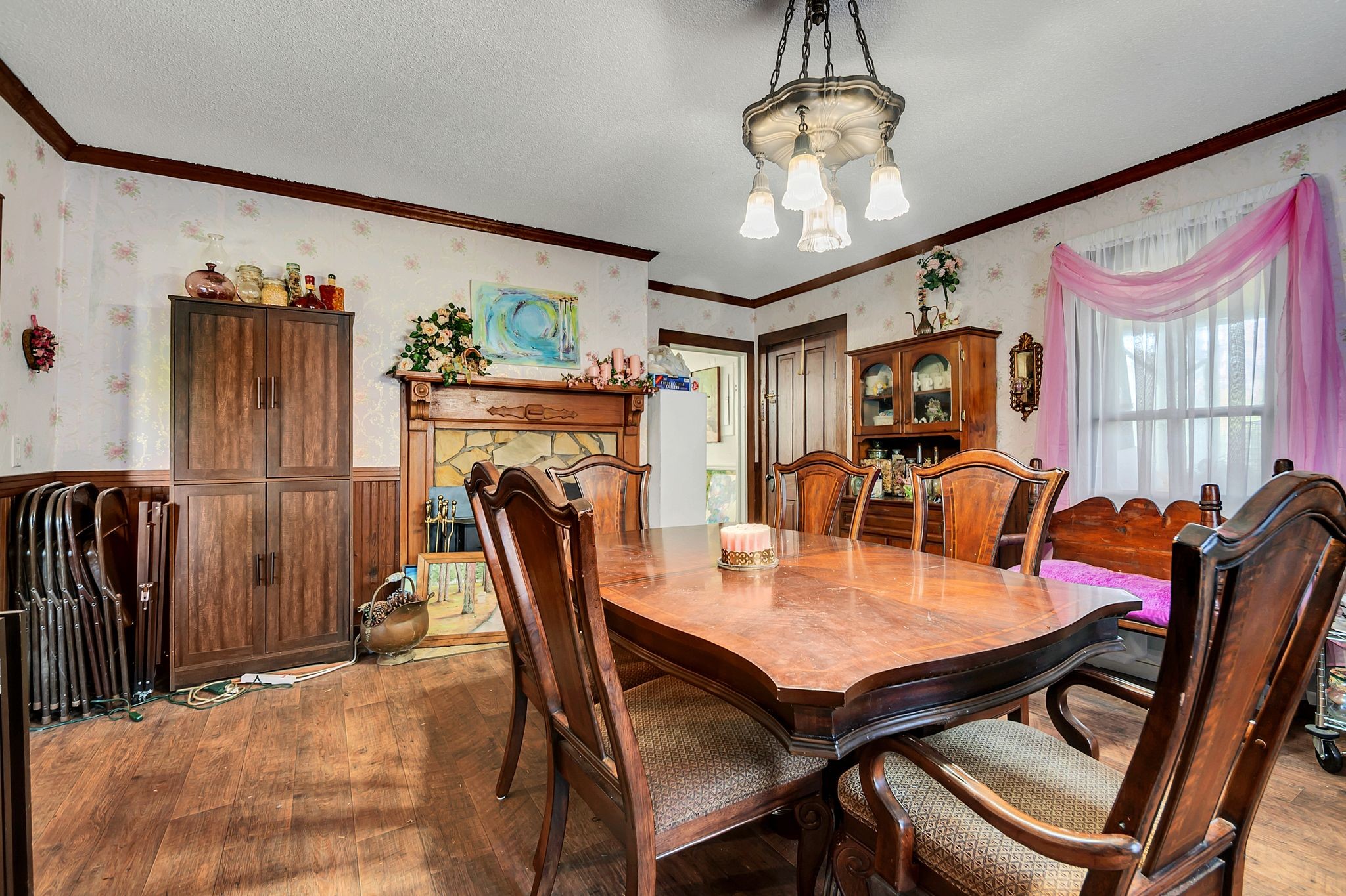 26454 Austin Whitt Road Ardmore, TN 38449 - Photo 15 of 49 a view of a dining room with furniture a chandelier and wooden floor