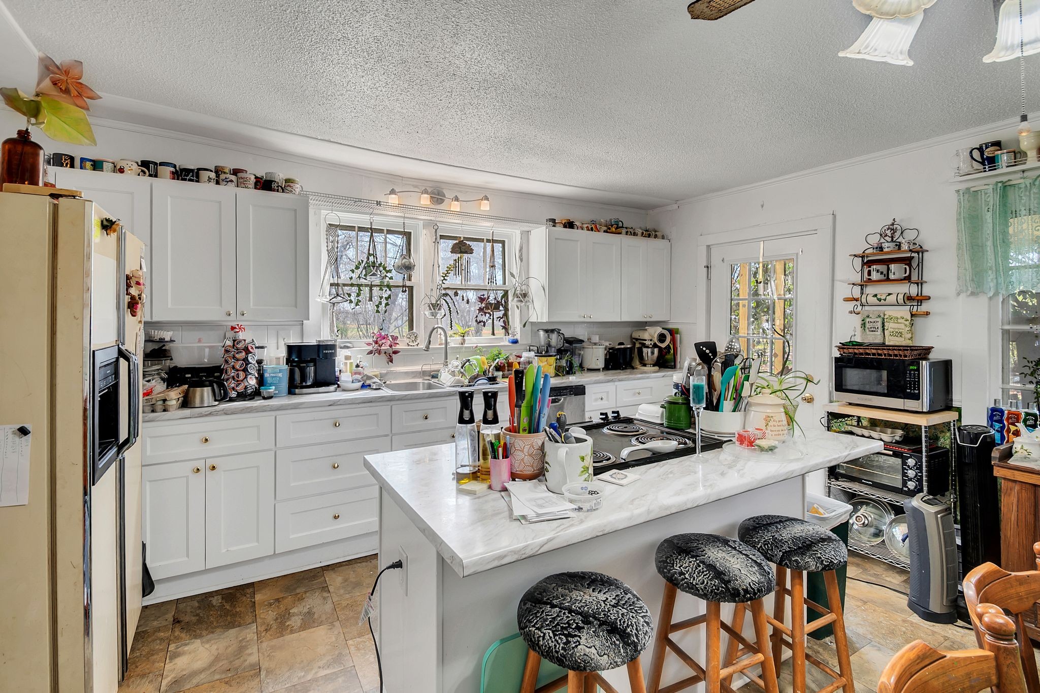 26454 Austin Whitt Road Ardmore, TN 38449 - Photo 21 of 49 a kitchen with a sink stove and refrigerator