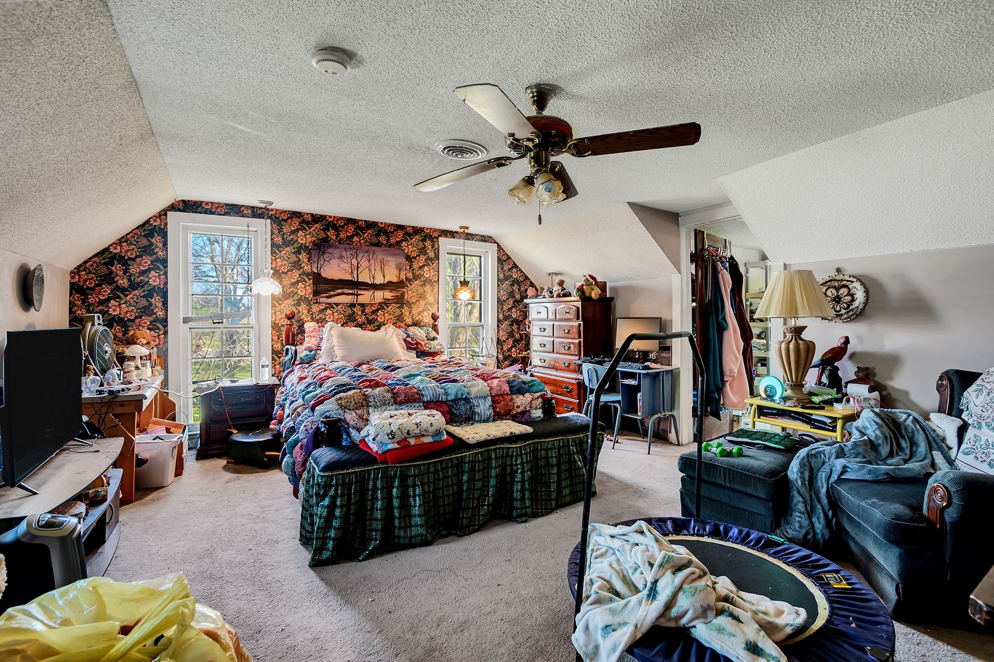 26454 Austin Whitt Road Ardmore, TN 38449 - Photo 30 of 49 a bedroom with a bed gym equipment and a large mirror