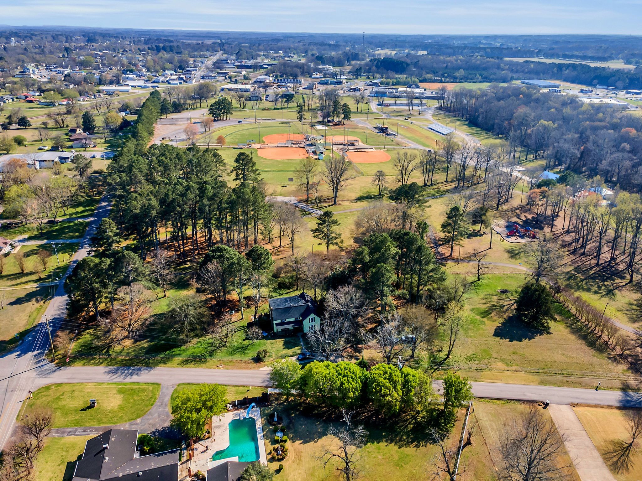 26454 Austin Whitt Road Ardmore, TN 38449 - Photo 3 of 49 an aerial view of residential houses with outdoor space