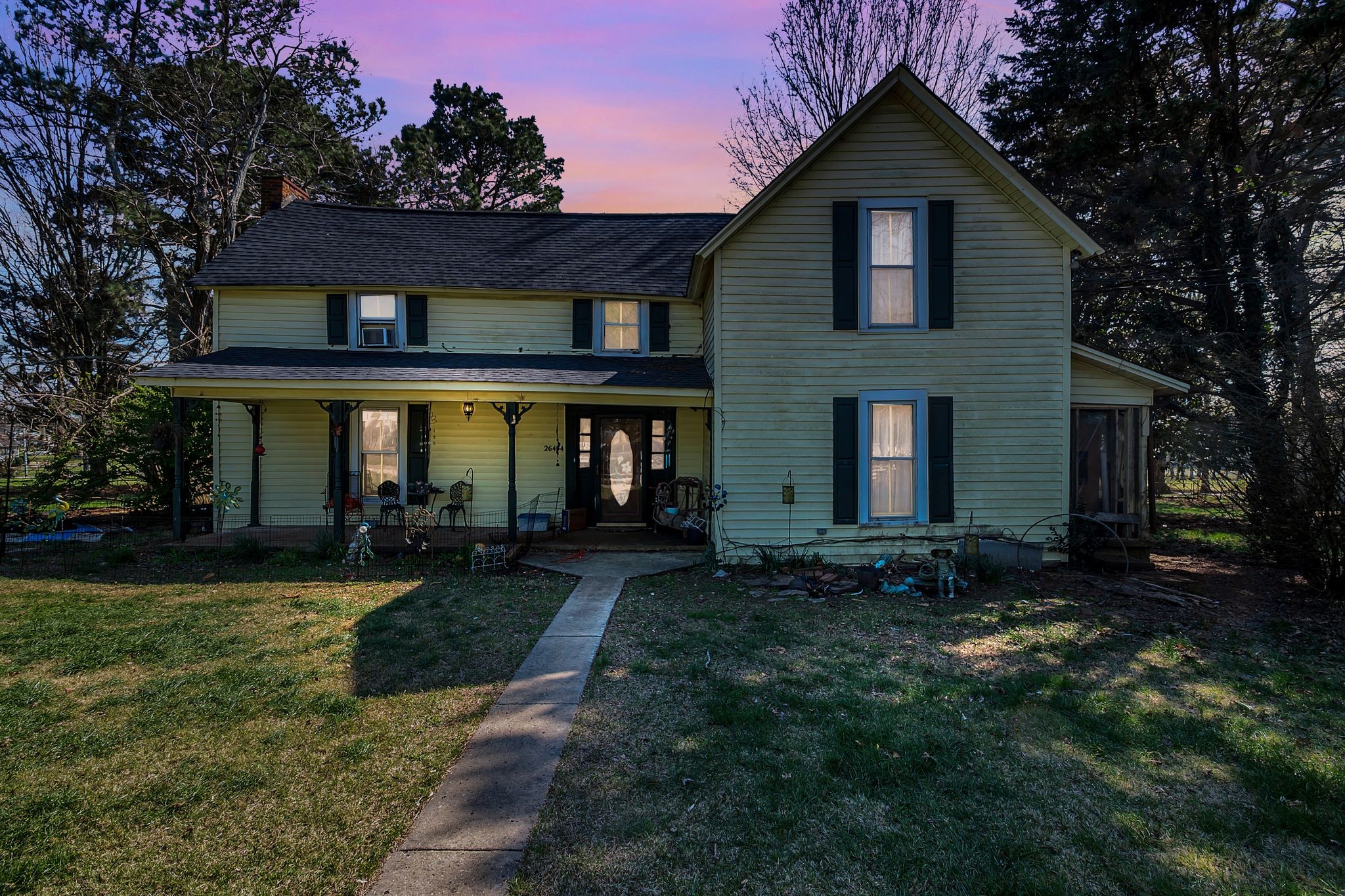 26454 Austin Whitt Road Ardmore, TN 38449 - Photo 9 of 49 a front view of a house with garden