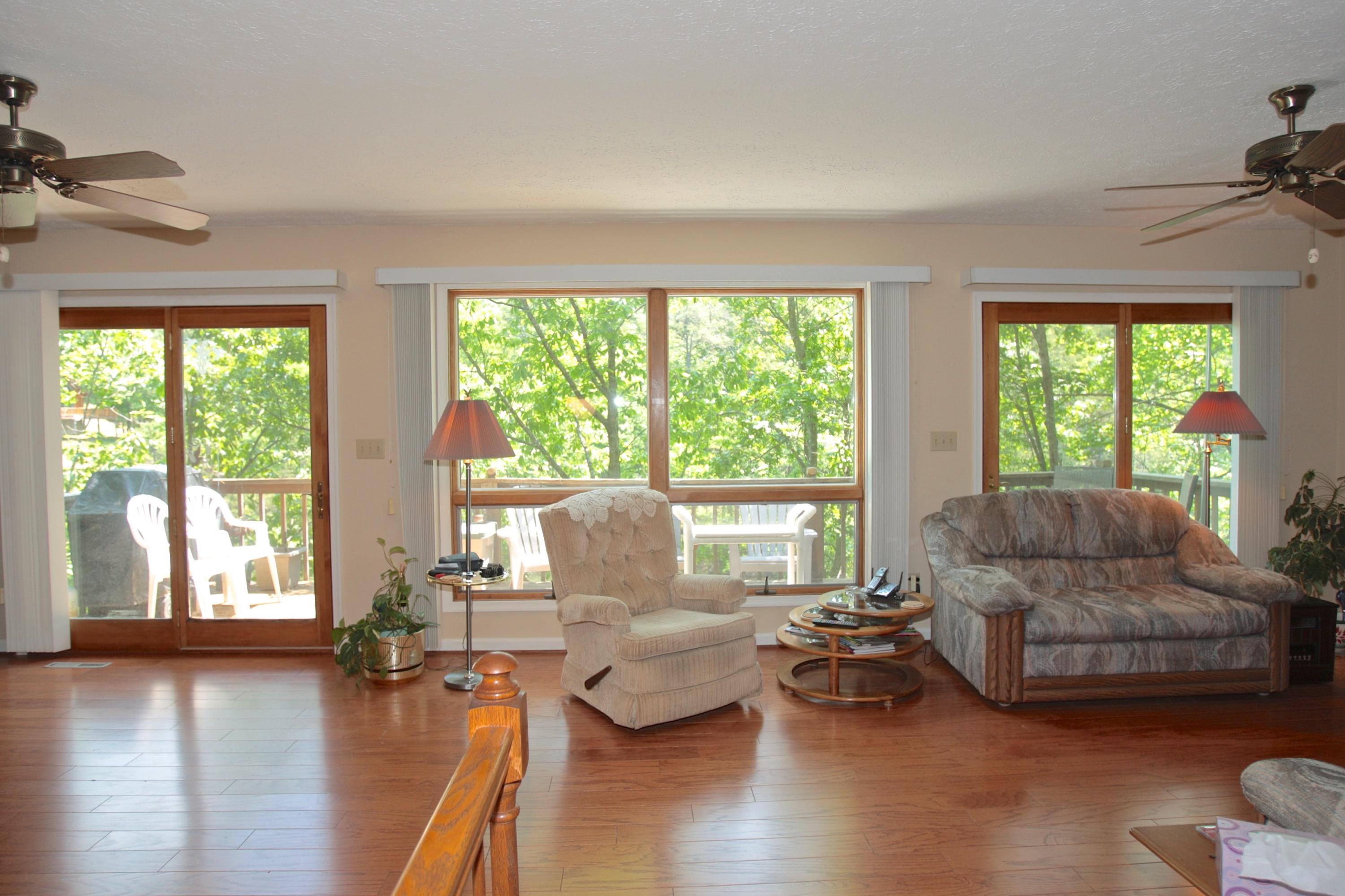 128 Thunder Ridge Road Huddleston, VA 24104 - Photo 2 of 88 Deck/ Lake Windows!