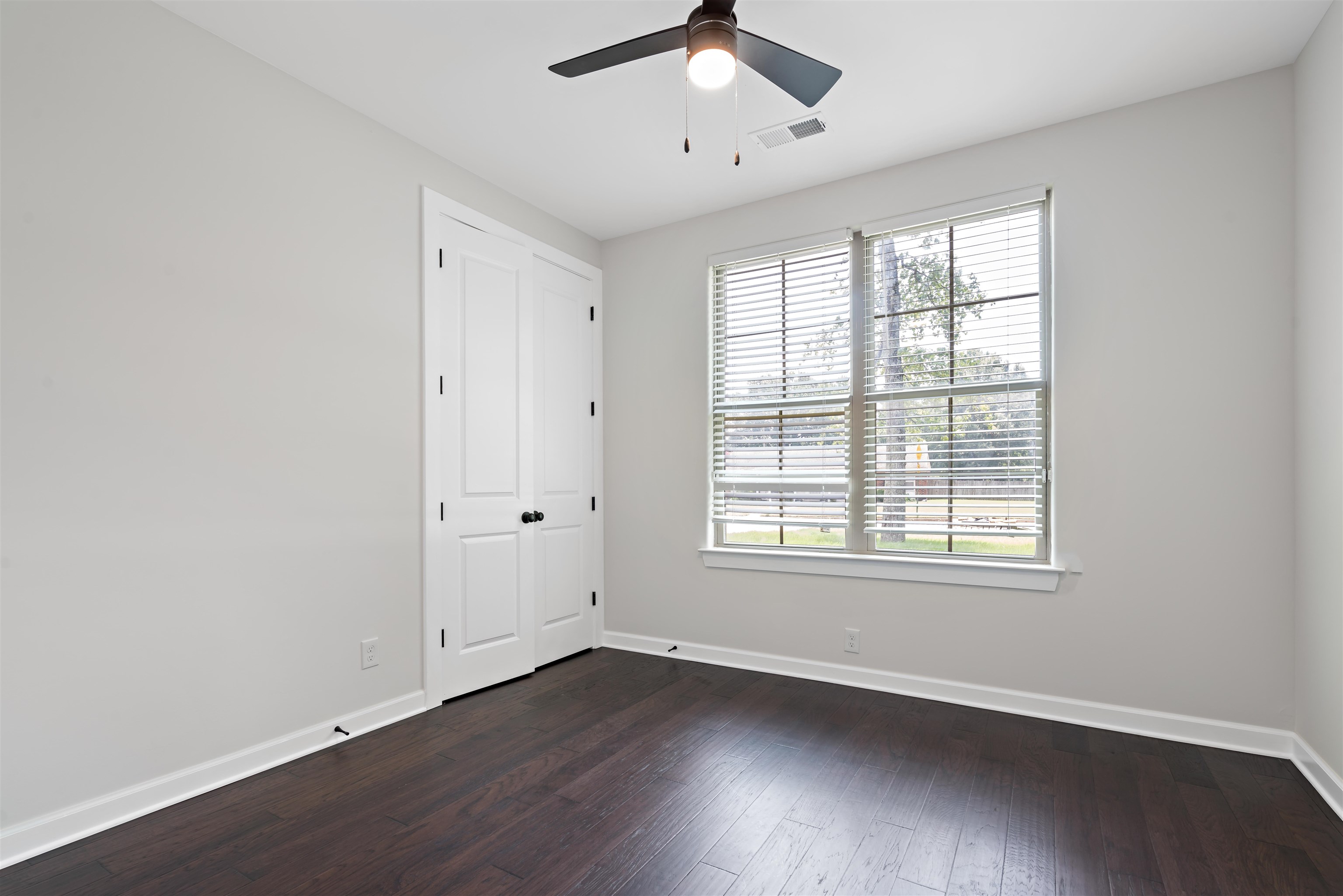 694 Brownlee Road Memphis, TN 38116 - Photo 13 of 15 Empty room featuring ceiling fan and hardwood / wood-style floors