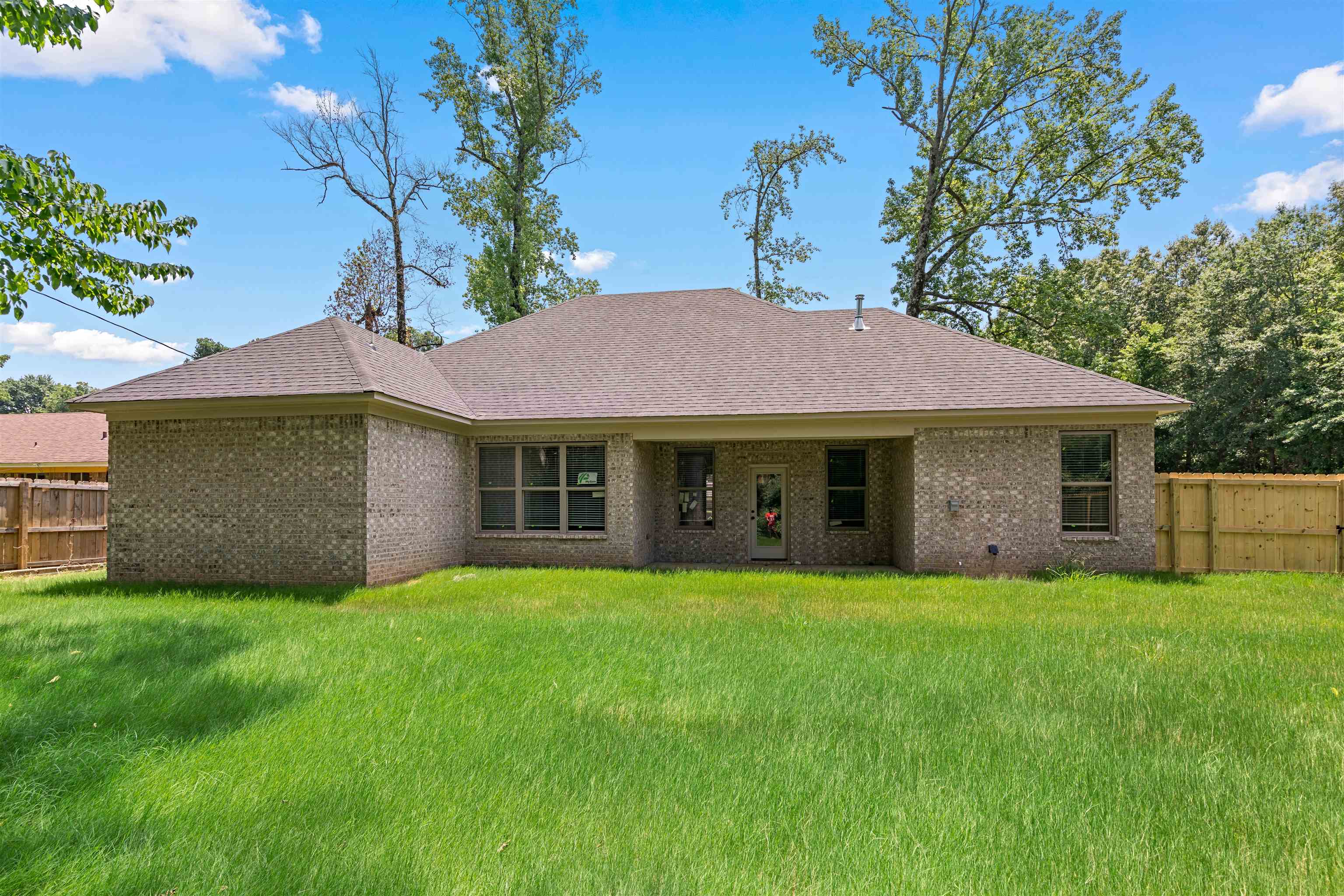 694 Brownlee Road Memphis, TN 38116 - Photo 14 of 15 Back of property featuring a yard