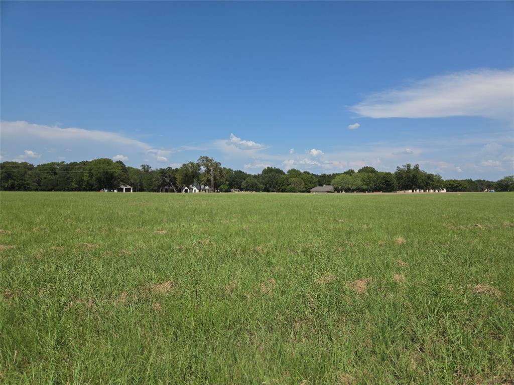 Lot 72-73 Tonkawa Trail Corsicana, TX 75109 - Photo 11 of 37 a view of a lake in middle of a field