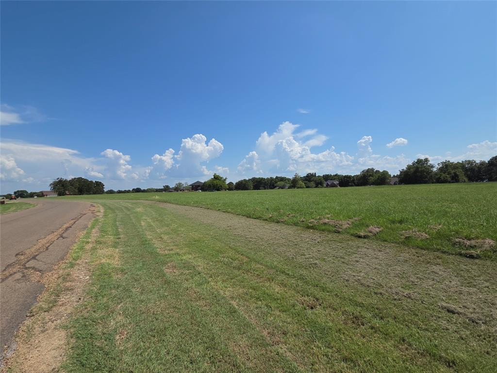 Lot 72-73 Tonkawa Trail Corsicana, TX 75109 - Photo 20 of 37 a view of a lake in middle of forest