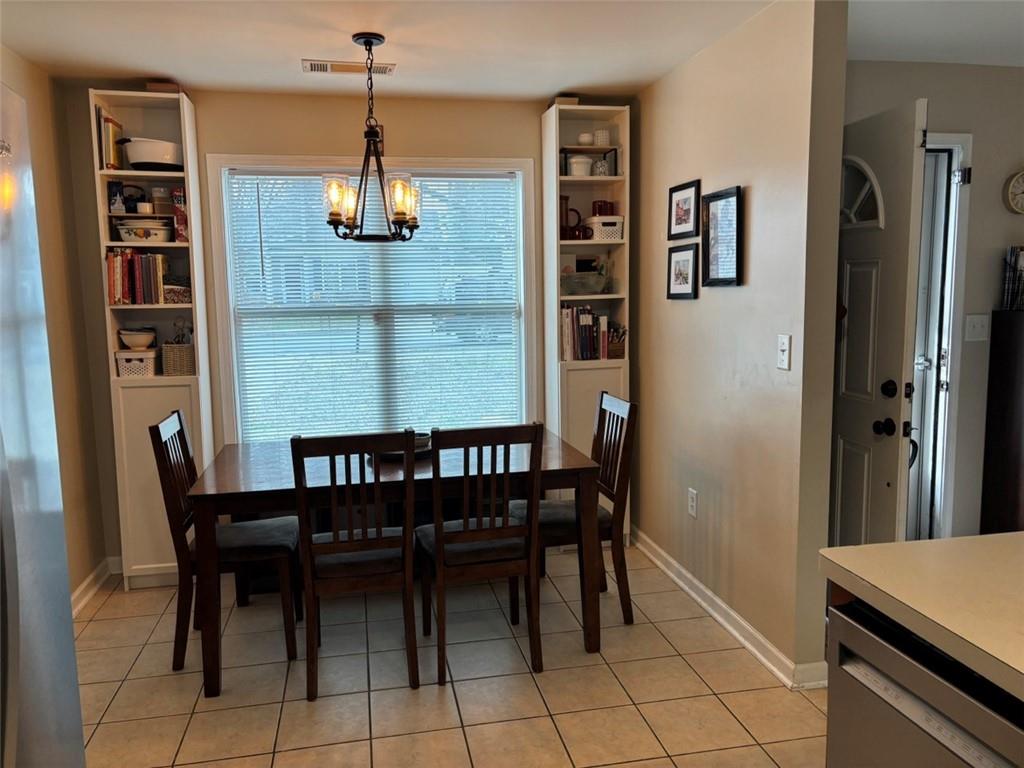 142 Melody Lane Northwest Rome, GA 30165 - Photo 14 of 45 a dining room with furniture and window