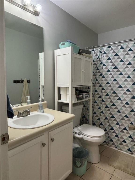 142 Melody Lane Northwest Rome, GA 30165 - Photo 19 of 45 a white toilet sitting next to a bathroom sink