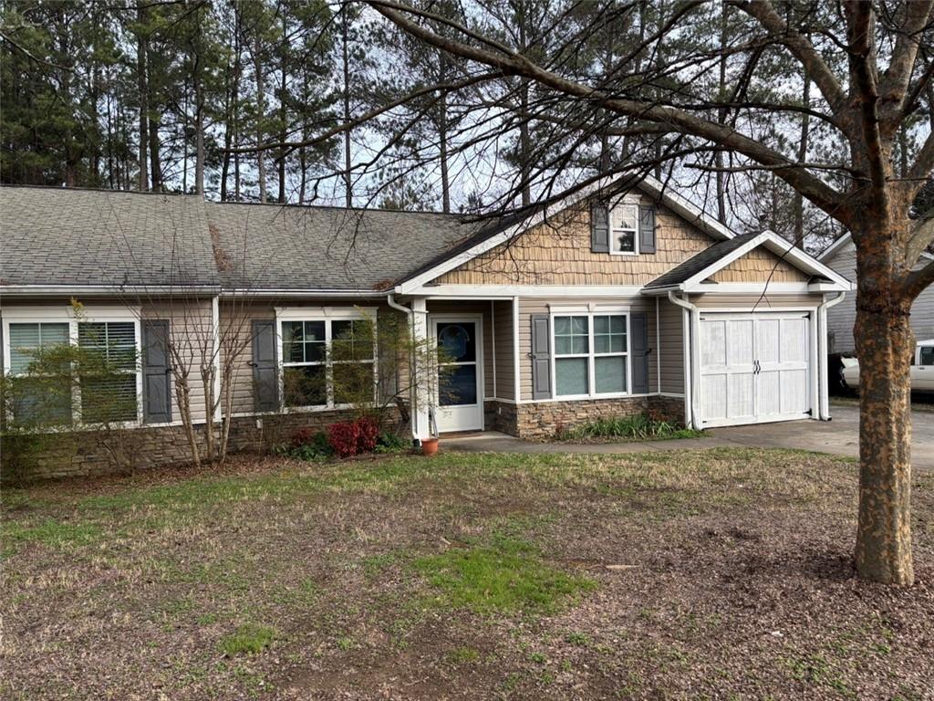 142 Melody Lane Northwest Rome, GA 30165 - Photo 4 of 45 a front view of a house with a garden and porch