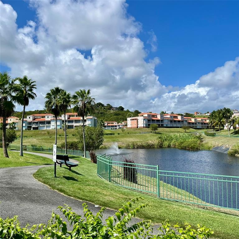 180 Cond Harbour Lakes, Unit 35D Humacao, PR 00791 - Photo 1 of 1 an aerial view of a house having yard